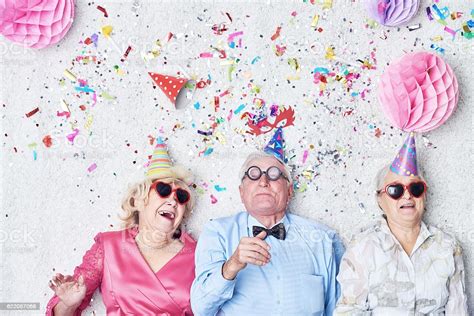 Some birthday guests of honor don't want a big party, instead they love small celebrations with their loved ones. Party Stock Photo - Download Image Now - iStock