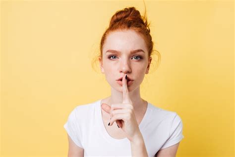 Free Photo Beauty Ginger Woman In T Shirt Covering Her Mouth