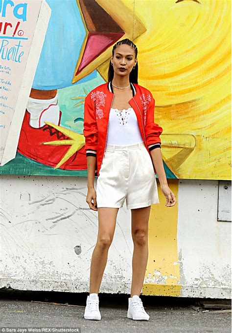 Joan Smalls Flaunts Long Legs In Colourful Outfit While Modeling On The