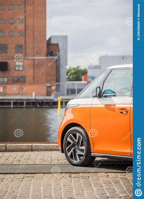 Vertical Shot Of An Orange Volkswagen Vw Id Buzz Pro Modern Electric