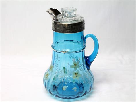 Vintage Blue Glass Pitcher Silver Spout Hand Painted Flowers Etsy Blue Glass Pitcher Blue