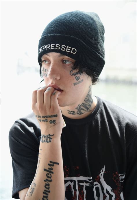 A Guide To All Of Lil Xans Face Tattoos For Those Of You Who Are