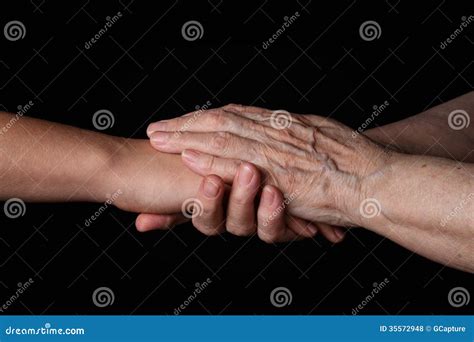 Granddaughter And Grandmother Holding Hands Stock Photo Image Of Help