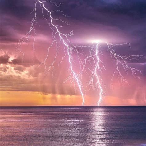Tropical Ocean Storm And Lightning Strike At Sunset In
