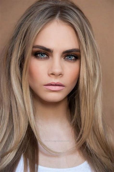 Exotic upturned, almond shaped icy blue eyes with angular bone structure, large full mouth, dark hair and alabaster skin. Dark blonde hair a beautiful straight hair, girl with blue ...