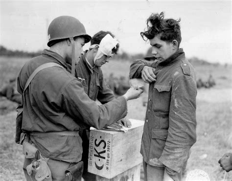 German Pows With American Soldier