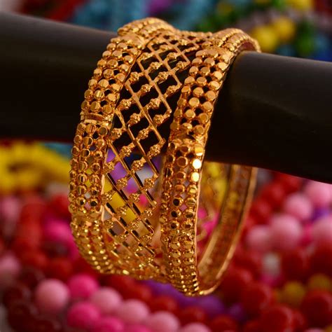 Since then bangles have transformed into several patterns, metals, styles and designs. Golden bangles set(Punjabi jewellery) - Radhas Creations ...