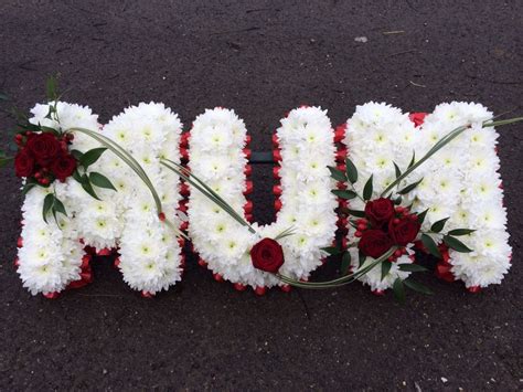 Mum Tribute Edged With Red Ribbon Based With White Chrysanthemums