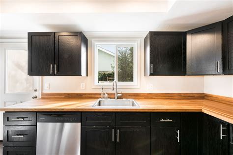 In a crisp white hue, this fan is mounted on a downrod and has four engineered wood blades for an understated silhouette. Contemporary Kitchen in ORANGE, CA | Zillow Digs | Zillow