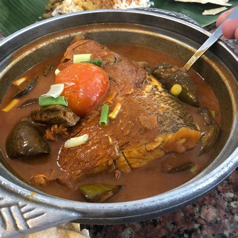 The oysters were the pick of the day for me but the scallops and the fish dis. Fish Head Curry (Small) at Karu's Indian Banana Leaf ...