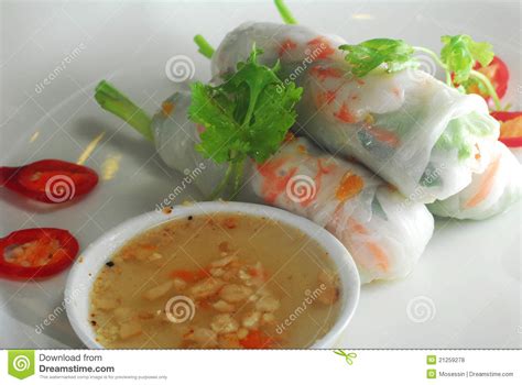 Fresh vegetables and shrimp stuffed tightly in glassy spring roll skins. Rice Noodle Skin Spring Roll Royalty Free Stock Photos ...