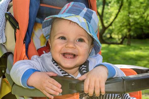 Cute Baby Boy In A Stroller Stock Image Image Of Comfortable Healthy