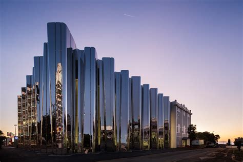 This New Museum Is Wrapped In A Wavy Facade Of Reflective Stainless