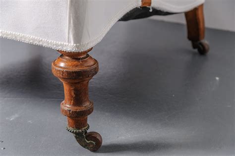 Maybe you would like to learn more about one of these? Victorian Tufted Chair w/ Wooden Legs on Casters : On ...