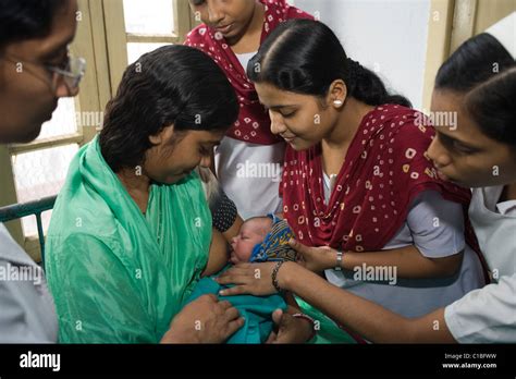 Nurses Helping Breastfeed Hi Res Stock Photography And Images Alamy