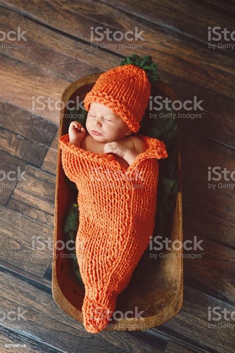 Newborn Baby Dressed As A Carrot Stock Photo Download Image Now