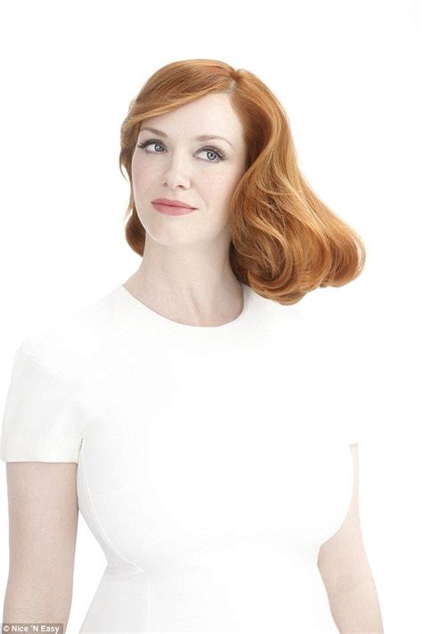 Christina Hendricks Shows Off Her Famous Flame Haired Locks As She