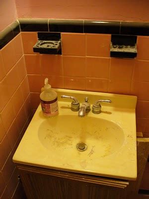 I know this is probably going to be hard to believe, but that beautiful bathroom above used to look like this. My Notting Hill: Painting Ceramic Tiles & Bathroom Makeover