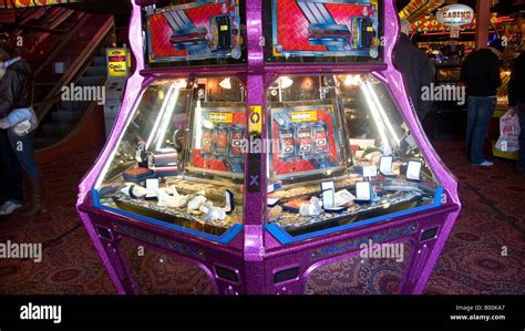 Penny Falls Machine In An Amusement Arcade Scarborough Stock Photo Alamy