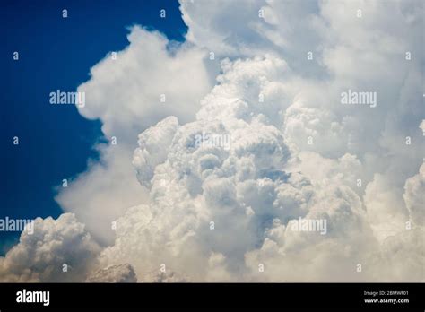 Cumulus Humilis Clouds In The Blue Sky View From Below Stock Photo Alamy