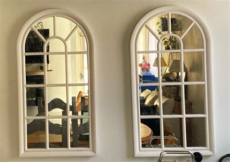 Window Mirrors How To Make Your Apartment Look Like You Have More
