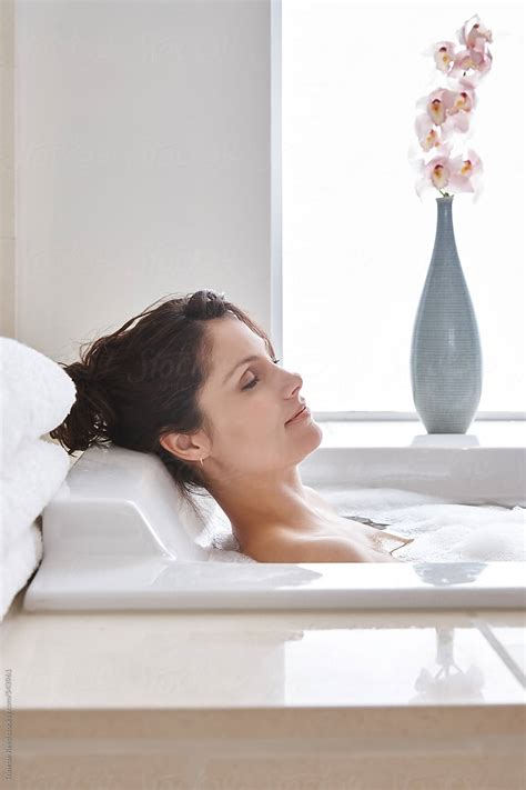 Woman Taking A Bath In Luxury Bathroom By Stocksy Contributor