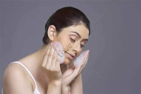 Beautiful Woman Applying Soap Suds On Face Against Gray Background Photo Picture And Hd Photos