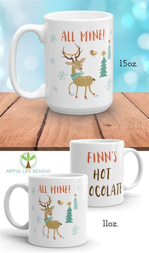 Two White Coffee Mugs With The Words Finns Hot Chocolate And An Image