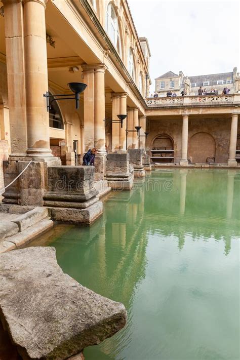 Tourists Visit The Roman Baths Of Bath Vertical Photo Editorial