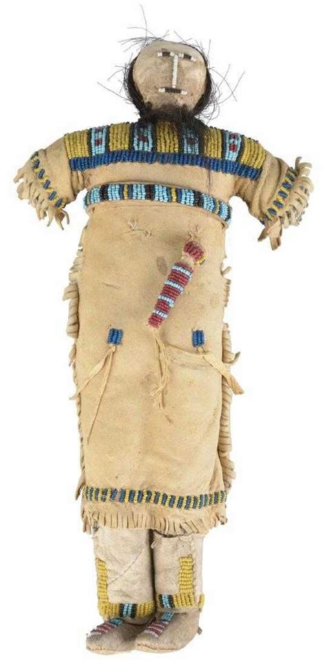 An Old Native American Doll Is Standing Up