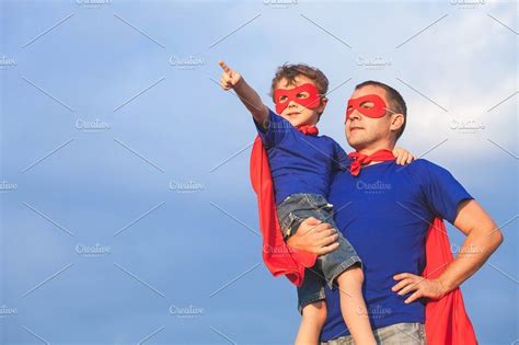 Father And Son Playing Superhero Father And Son People Having Fun Superhero