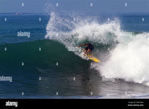 surfer ride a wave Stock Photo - Alamy