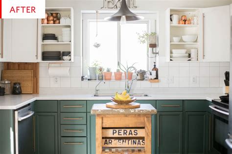 This bright and beautiful modern farmhouse kitchen incorporates a beautiful custom made wood hood with white upper cabinets and a dramatic black base cabinet from kraftmaid. Painted Tuxedo Kitchen Cabinets - DIY Project Photos | Apartment Therapy