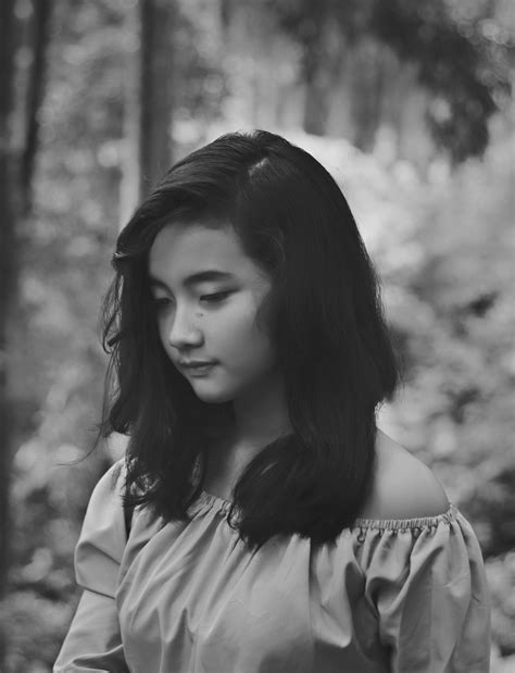 Black And White Portrait Of The Cute Asian Girl Among The Plants Free