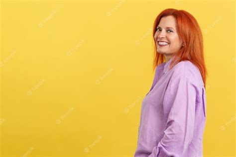 premium photo happy redheaded mature woman smiling at the camera
