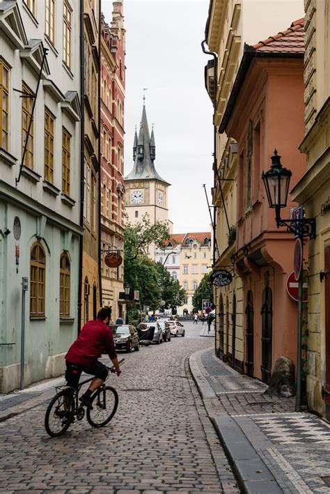 Cyclist In Cobblestoned Street In Prague Editorial Stock Photo Image