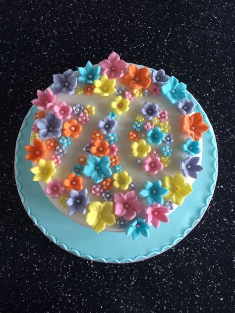 Get home delivery of birthday cakes whether it's the first birthday, 10the birthday, 16th birthday, 25th birthday, 50th birthday, or 70th birthday. 70th Birthday cake with fondant flowers | 70th birthday ...