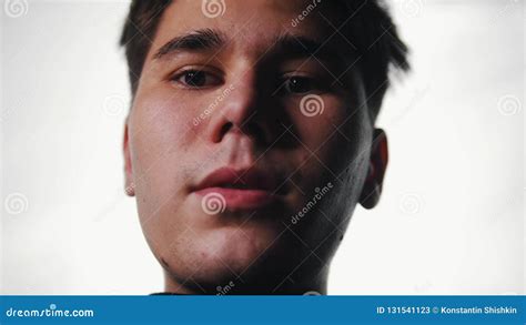 A Man Looking Down In The Camera Bright Light Stock Image Image Of