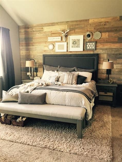 A pallet wall or shiplap wall can instantly transform a room. Stained Shiplap wall in bedroom | Rustic master bedroom ...