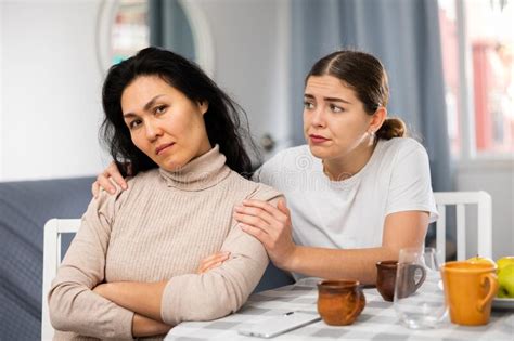 Young Woman Comforting Her Depressed Female Friend Stock Photo Image