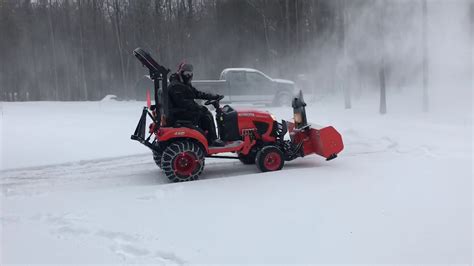 Kubota Bx2380 With Front Mount Snowblower Blowing Snow Youtube