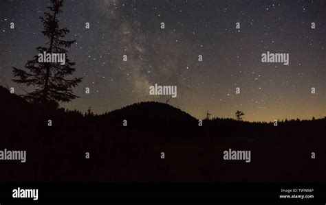 Purple Night Sky Stars Over Mountain Milky Way Galaxy In Summer Starry
