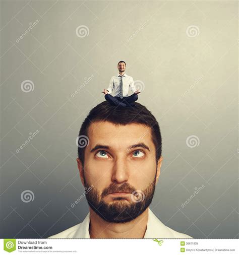 Small Man Resting On The Big Head Man Stock Photo Image