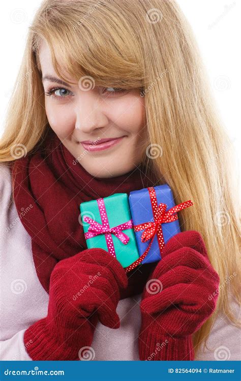 Woman Holding Wrapped Gifts For Christmas Or Other Celebration Stock