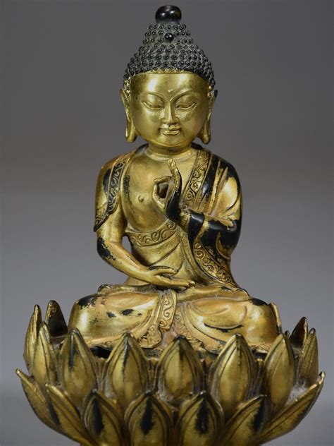 Superb Quality Gilt Bronze Tibetan Buddha Seated Within A Lotus Flower