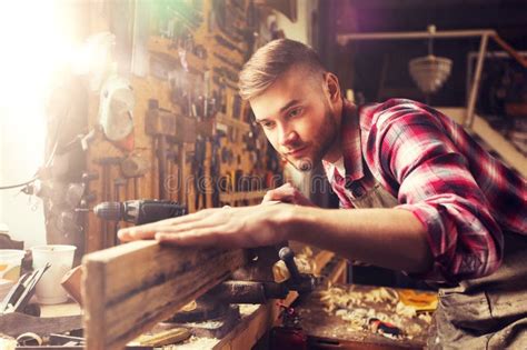 Carpenter Working With Wood Plank At Workshop Stock Photo Image Of