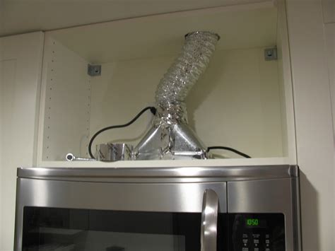 How can you vent a range hood to the outside? Trashed Condo Transformation: Venting A Condo Stove Hood ...