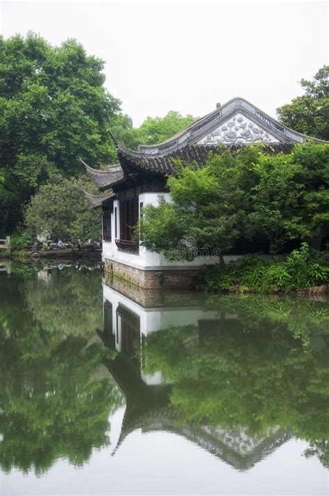 A Traditional Chinese Building On A Pond Shanghai China Stock Photo