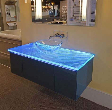 The bathroom is associated with the weekday morning rush, but it doesn't have to be. Glass Counter atop Robern Vanity - Downing Designs