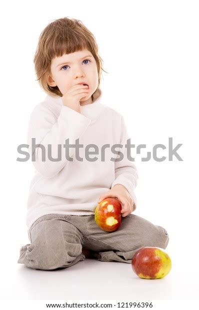 Beautiful Little Girl Eat Apples Isolated Stock Photo 121996396